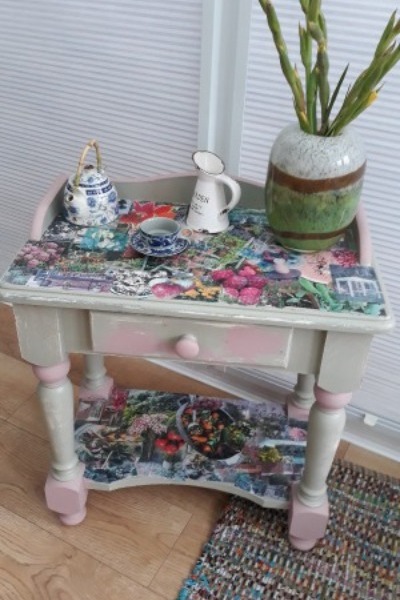 Wooden table with decoupage from old birthday cards