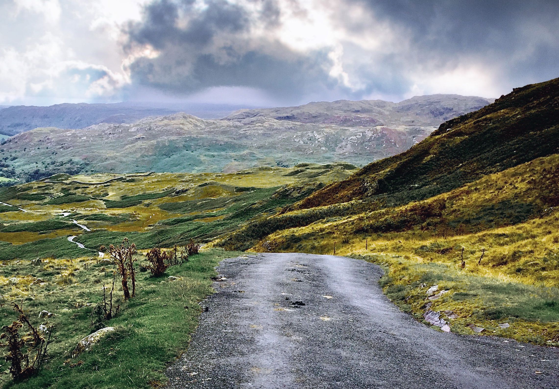 rolling hills and path running through