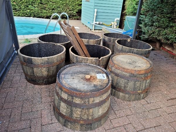 8 bourbon barrels outside