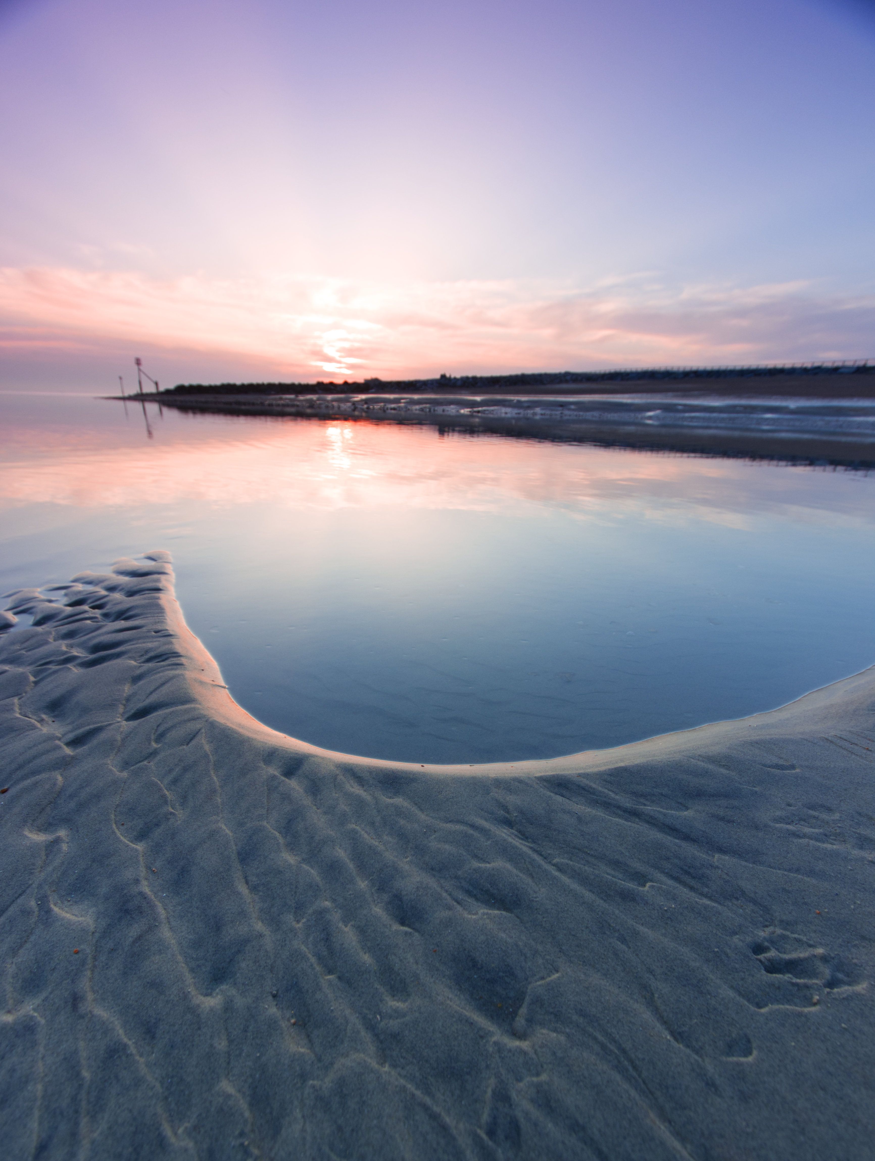 pink and blue sunset on beach