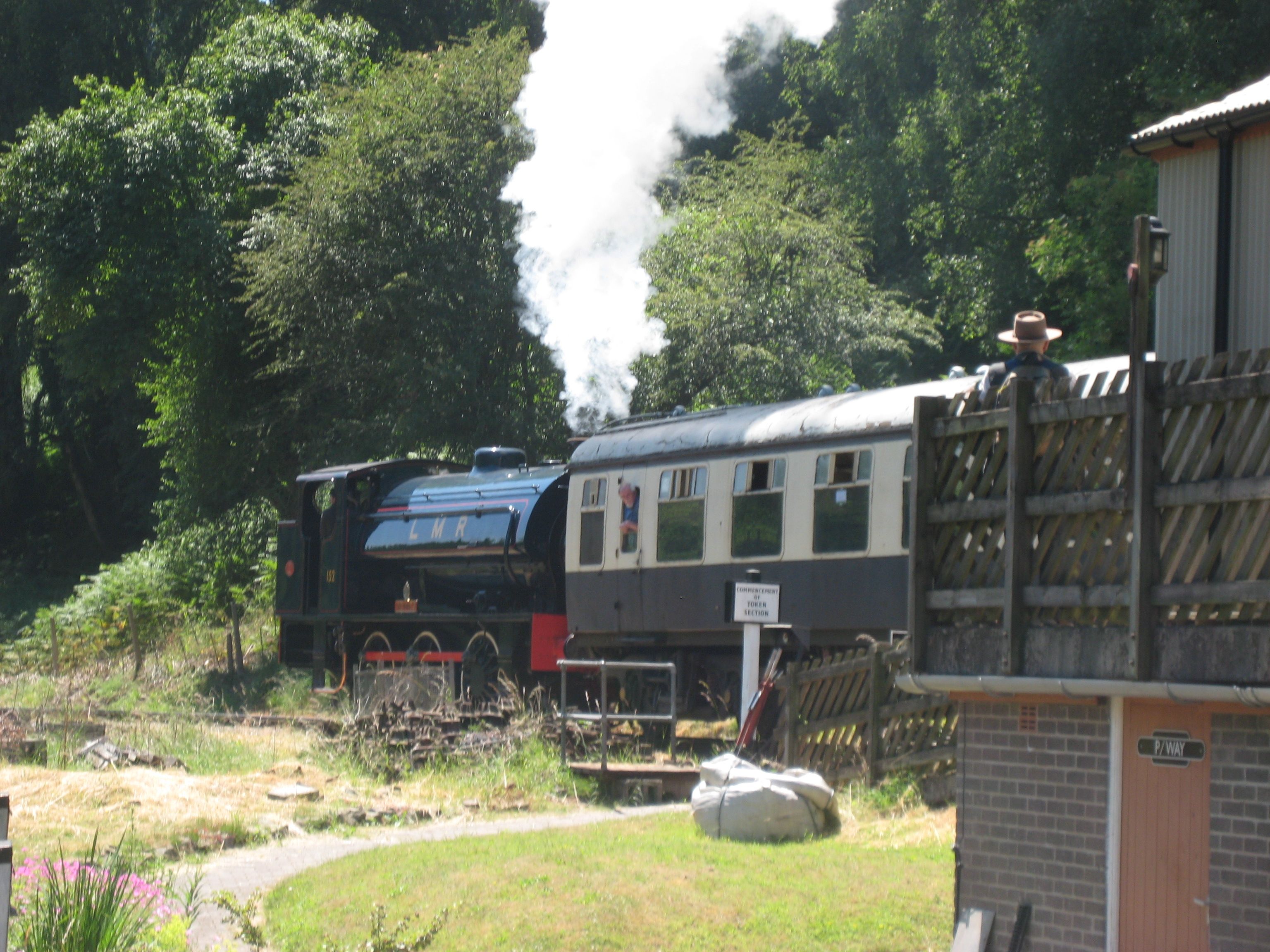 A classic steam engine with one carriage