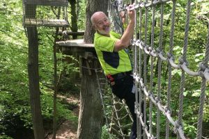 A man on a go ape adventure course